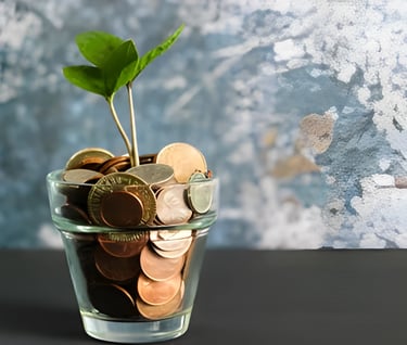 Glass vase with coins and a small plant sprouting, illustrating growth and education loan solutions