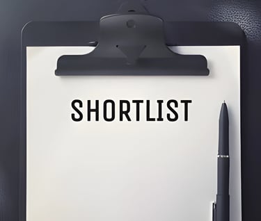 Clipboard with 'SHORTLIST' bold text, symbolizing university shortlisting service for studyingabroad