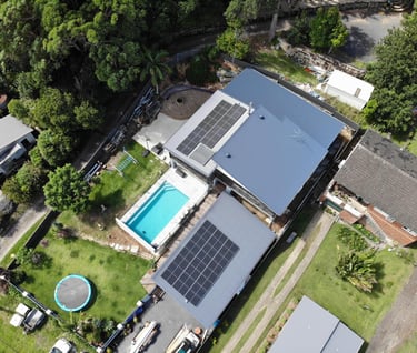 home with pool and solar panels
