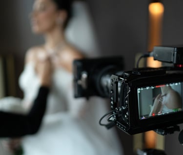 Glasgow wedding videographer filming bridal prep on cinema camera.