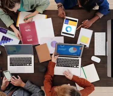 Marketing team at TrendBeatz Technologies analyzing advertising performance reports and digital camp