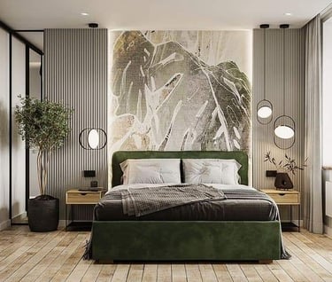 a bedroom with a large painting on the wall decoration side table