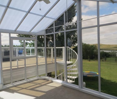 Gable Solarium with acrylic walls and polycarbonate roof.