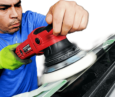 Paint correcting a side car panel in Alamo Heights