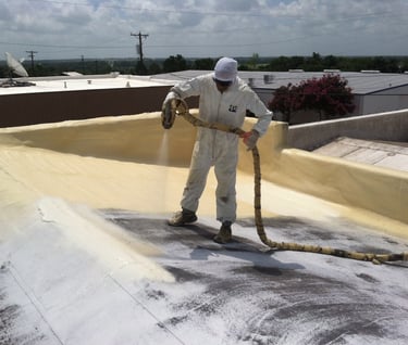 a man in a white suit and a hose on a roof