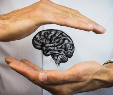 a man holding a brain map of a brain