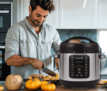 a man is cutting up some food in a kitchen