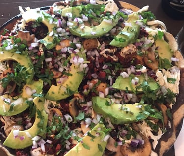 Delicious tlayuda at one of the best places to eat Oaxacan (Oaxaca) food in Mexico City (CDMX).