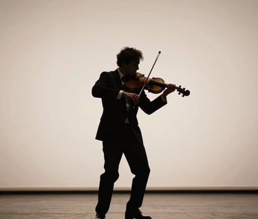 A professional violinist performing on a dimly lit stage of a classic Southern European / Spanish theater. Elegant silhouette against a soft off-white background, wearing formal attire. The composition is clean and artistic.
