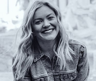 a woman with blonde hair and a denim jacket, wedding planner
