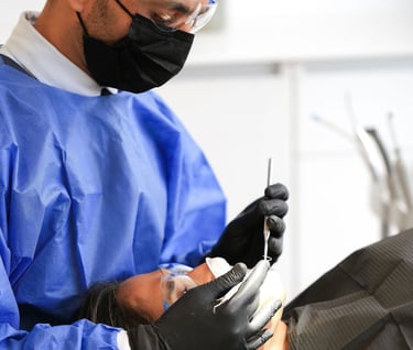 a man in a blue scrub suit and a woman in a blue scrub suit