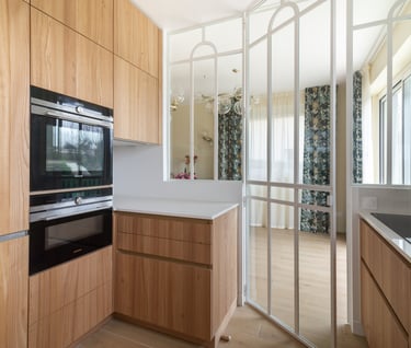 a kitchen with a stove top oven and a microwave