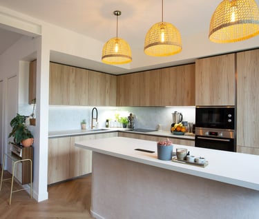 a kitchen with a large island and a large island