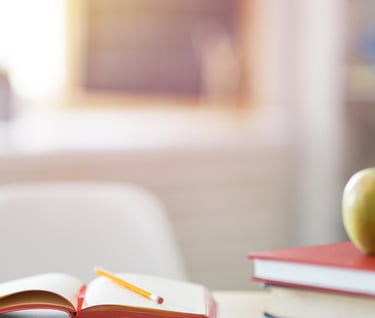 a book and a book with a pencil and pencils