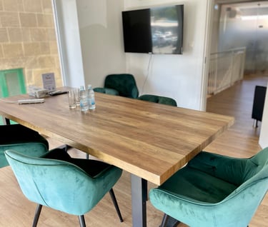 Meeting room, office desk, office chairs, TV