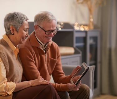 relationships and longevity - a man and woman sitting on a couch