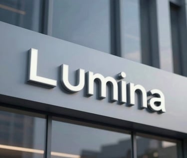 A corporate building exterior with the Lumina logo subtly integrated into the signage. Professional lighting, dusk setting, using #0D1B2A and silver tones.