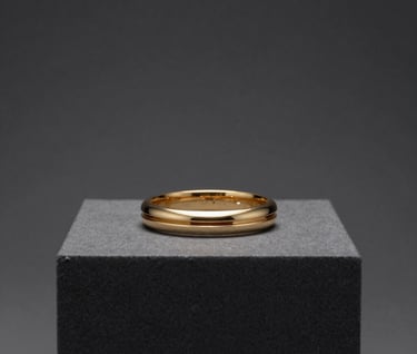 Minimalist editorial shot of high-end jewelry on a dark gray pedestal with professional lighting and a sophisticated aesthetic. International / Professional.