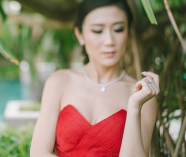 Bridal portrait in red gown at The Ritz-Carlton Nusa Dua Bali.