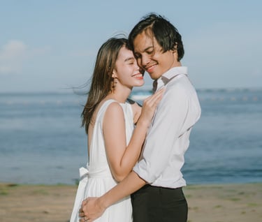 Romantic couple portrait by the sea at Novotel Bali Benoa in Tanjung Benoa Bali.