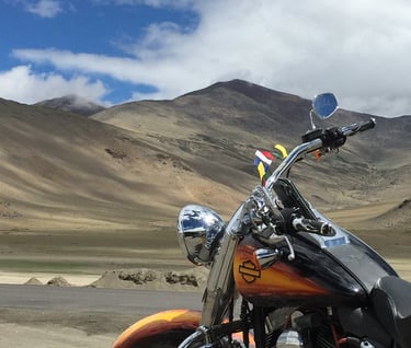a motorcycle parked in a desert area