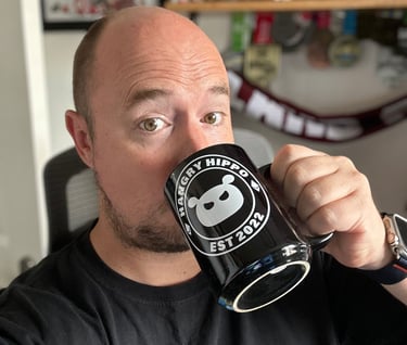 Cliffinkent drinking from a Hangry Hippo Mug