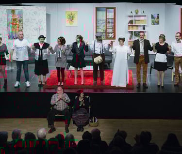 a group of people standing on a stage