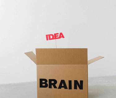 Creations and Solutions: a box with the word idea above  it
