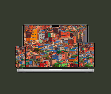 a laptop computer and a laptop with a cityscapeople on it
