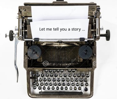 old fashioned typewriter with "let me tell you a story..." typed on white page