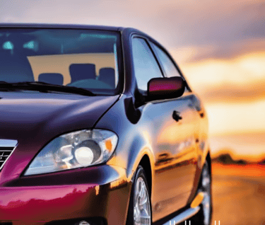 Toyota Corolla car parked on the side of a road
