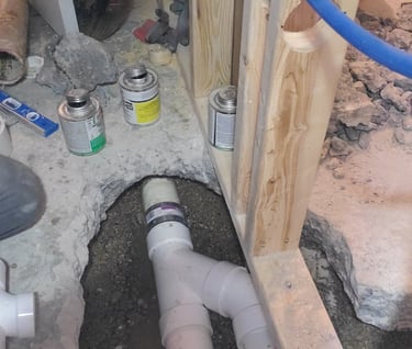 rough installation of plumbing pipes during a bathroom remodeling project