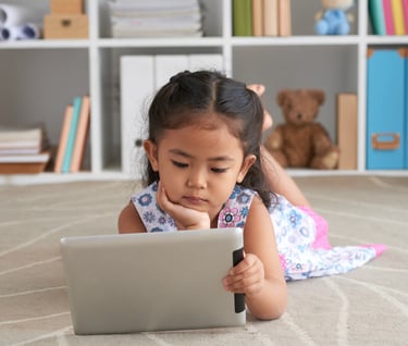 toddler using tablet