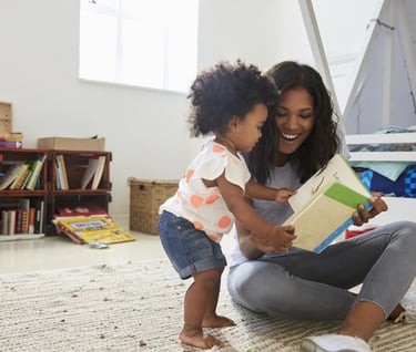 mom reading to toddler