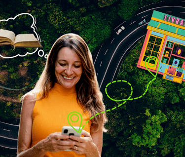 consumidora usa um celular para a jornada de compra de um livro