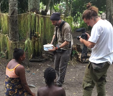 Tourists making video in the remote village in Photography Tours in Benin