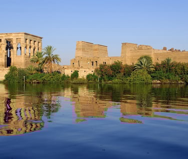 a statue of a man on a boat in the water