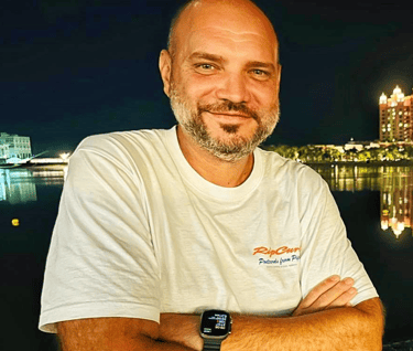 a man with a watch on his wrist