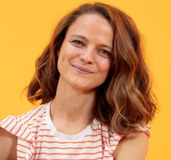 a woman with a guitar and a guitar