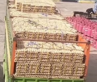 a truck with table egg on it