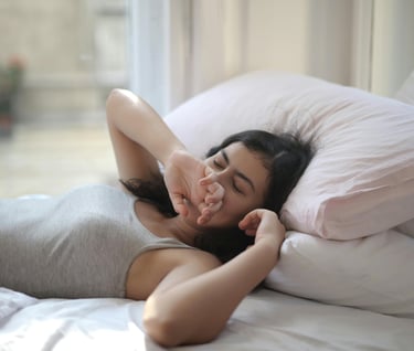 A woman sleeping in bed