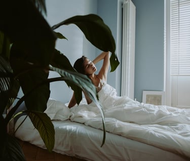 An Asian woman waking up