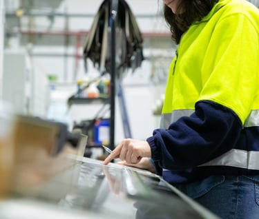 industrial-engineer-programming-machine-control-panel