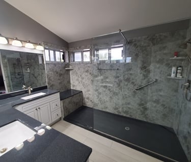 a bathroom with a shower and a shower