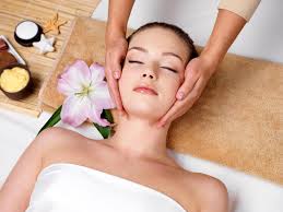 a woman getting a massage at a spa