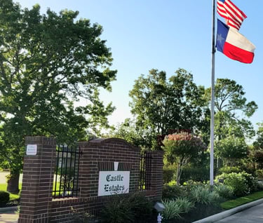Castle Estates subdivision entrance sign and flags