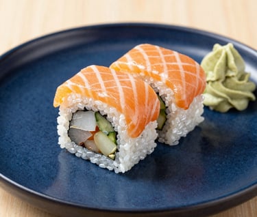 woman in black blazer with brown hair