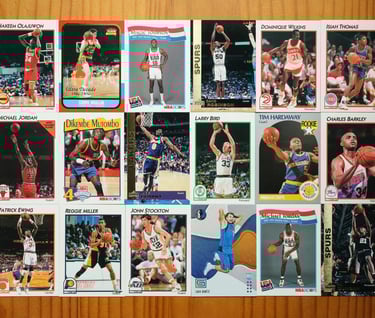 a collection of NBA sports cards and Vintage sports cards with many different NBA players