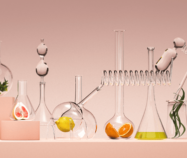 Zinzino BalanceOil and BalanceTest kits with laboratory glassware and fresh citrus fruits.