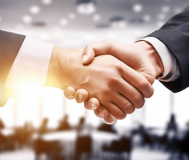 a business meeting with two people shaking hands